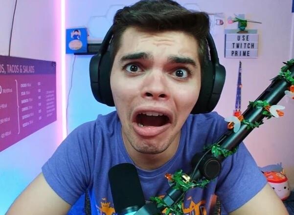 Treverse staring into the camera with a scared expression.